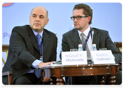 Federal Tax Service head Mikhail Mishustin and Deputy Chief of the Government Staff Kirill Androsov at international conference, Thinking of Taxes in a New Way|21 november, 2011|16:07