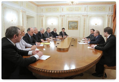 Prime Minister Vladimir Putin meets with the leaders of the United Russia parliamentary party in the State Duma