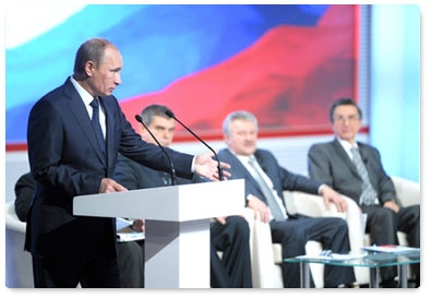 Prime Minister Vladimir Putin takes part in the National Transport Conference plenary session in Novosibirsk