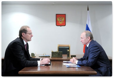 Prime Minister Vladimir Putin meets with Novosibirsk Region Governor Vasily Yurchenko