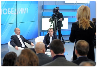 President Dmitry Medvedev and Prime Minister Vladimir Putin meet with voters