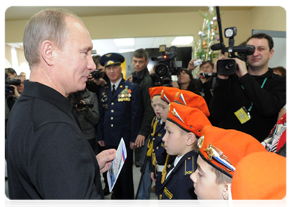 Prime Minister Vladimir Putin visiting the Evrika lyceum in the town of Cheryomushki|19 december, 2011|11:52