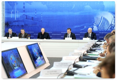 Prime Minister Vladimir Putin chairs a meeting of the government commission on electricity generation while at the Sayano-Shushenskaya hydroelectric power station