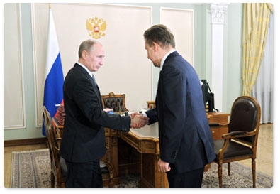 Prime Minister Vladimir Putin meets with Gazprom CEO Alexei Miller