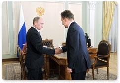 Prime Minister Vladimir Putin meets with Gazprom CEO Alexei Miller