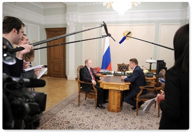 Prime Minister Vladimir Putin meets with Gazprom CEO Alexei Miller