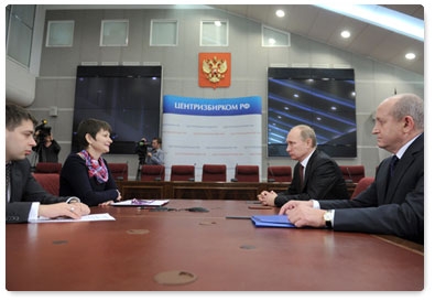 Prime Minister Vladimir Putin submits documents to the Central Election Commission to register as a presidential candidate for the March 4, 2012 elections