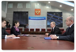 Prime Minister Vladimir Putin submits documents to the Central Election Commission to register as a presidential candidate for the March 4, 2012 elections