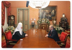 Prime Minister Vladimir Putin meets with Patriarch Kirill of Moscow and All Russia to congratulate him on the second anniversary of his enthronement