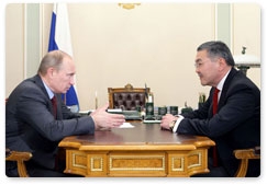 Prime Minister Vladimir Putin holds a working meeting with Alexei Orlov, head of the Republic of Kalmykia