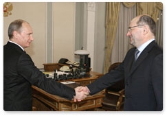 Prime Minister Vladimir Putin holds a meeting with Sverdlovsk Region Governor Alexander Misharin