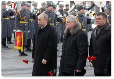 Prime Minister Vladimir Putin attends the wreath-laying ceremony at the Tomb of the Unknown Soldier in Alexander Garden