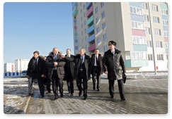 Prime Minister Vladimir Putin tours the Severny residential district in Kaliningrad, which is being developed for Baltic Fleet officers