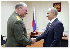 Vladimir Putin meets with members of the public at the Kaliningrad community liaison office of the United Russia party