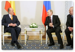 Prime Minister Vladimir Putin meets with Spanish King Juan Carlos I  in St Petersburg