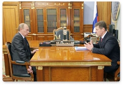 Prime Minister Vladimir Putin meets with Deputy Prime Minister Dmitry Kozak