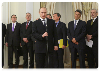 Prime Minister Vladimir Putin looking on as Novatek and France’s Total sign cooperation memorandums|2 march, 2011|23:21