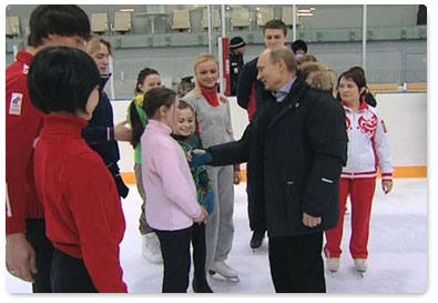 Vladimir Putin visits a skating rink in the Leningrad Region where athletes are training for the figure skating world championship in 2011