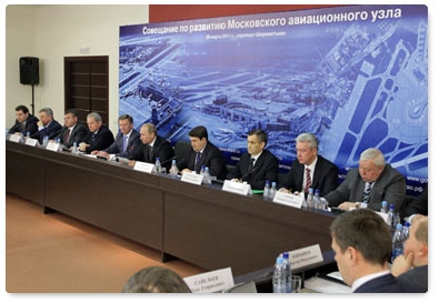 Prime Minister Vladimir Putin holds a meeting at Sheremetyevo Airport on the development of the Moscow air traffic hub