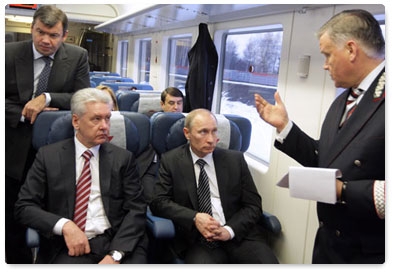 Prime Minister Vladimir Putin continues discussing the development of the Moscow air traffic hub while on a shuttle train from Sheremetyevo Airport back to Moscow