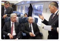 Prime Minister Vladimir Putin continues discussing the development of the Moscow air traffic hub while on a shuttle train from Sheremetyevo Airport back to Moscow