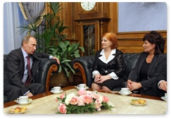 Prime Minister Vladimir Putin meets with the widows of miners who died in mining accidents in Vorkuta