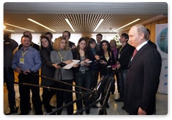 Prime Minister Vladimir Putin speaks to the media following  national forum of medical workers