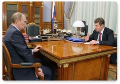 Prime Minister Vladimir Putin and Deputy Prime Minister Dmitry Kozak discuss preparations for the Sochi 2014 Olympics