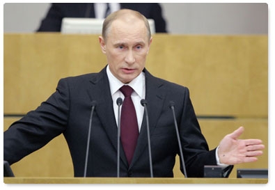 Prime Minister Vladimir Putin delivers a report on the government’s performance in 2010 in the State Duma