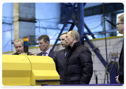 Prime Minister Vladimir Putin visiting the ZhBI-6 concrete plant where he checked out its production cycle and compared old and new equipment|25 april, 2011|16:29