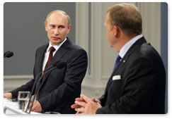 Prime Minister Vladimir Putin and his Danish counterpart Lars Lokke Rasmussen address the media to summarise their talks