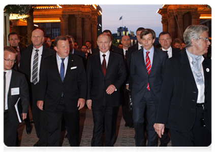 After completing the programme of his visit, Prime Minister Vladimir Putin tours Tivoli Gardens, the oldest European park, together with his Danish counterpart Lars Lokke Rasmussen|27 april, 2011|08:46