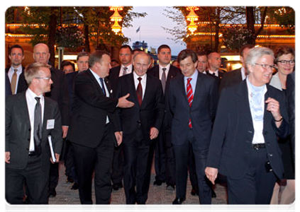 After completing the programme of his visit, Prime Minister Vladimir Putin tours Tivoli Gardens, the oldest European park, together with his Danish counterpart Lars Lokke Rasmussen|27 april, 2011|08:47