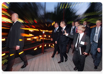 After completing the programme of his visit, Prime Minister Vladimir Putin tours Tivoli Gardens, the oldest European park, together with his Danish counterpart Lars Lokke Rasmussen|27 april, 2011|08:52