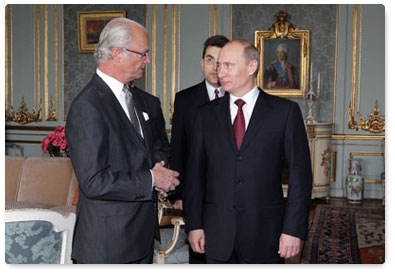 Prime Minister Vladimir Putin meets with King Carl XVI Gustaf of Sweden during his visit to Stockholm