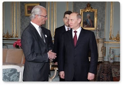 Prime Minister Vladimir Putin meets with King Carl XVI Gustaf of Sweden during his visit to Stockholm