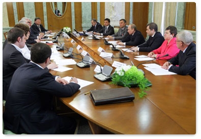 Prime Minister Vladimir Putin meets with representatives of the Russian Popular Front