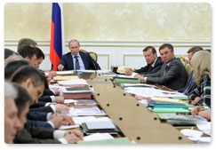 Prime Minister Vladimir Putin chairs a session of the Government Presidium