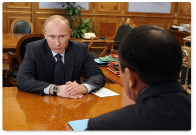 Prime Minister Vladimir Putin holds a meeting with Federation Council member Nikolai Fyodorov