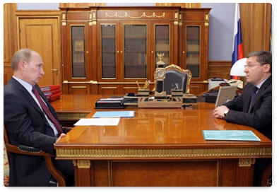 Prime Minister Vladimir Putin meets with  Tyumen Region Governor Vladimir Yakushev