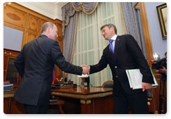 Prime Minister Vladimir Putin meets with Sberbank CEO German Gref