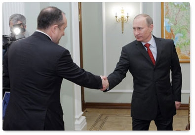 Prime Minister Vladimir Putin meets with Sergei Frank, general director of the state shipping company Sovcomflot