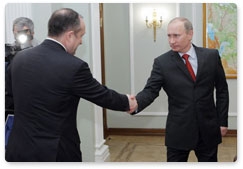 Prime Minister Vladimir Putin meets with Sergei Frank, general director of the state shipping company Sovcomflot