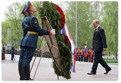 Prime Minister Vladimir Putin attends a wreath-laying ceremony at the Tomb of Unknown Soldier