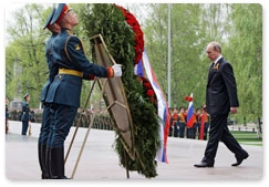 Prime Minister Vladimir Putin attends a wreath-laying ceremony at the Tomb of Unknown Soldier