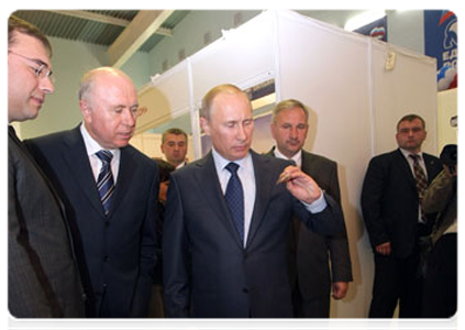 Prime Minister Vladimir Putin at the exhibition of local farming and food processing products in the village of Atemar during trip to Mordovia|10 june, 2011|17:04