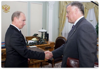 Prime Minister Vladimir Putin meets with Russian Railways CEO Vladimir Yakunin