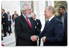 Prime Minister Vladimir Putin meets with International Labour Organisation General Director Juan Somavia during his working visit to Switzerland