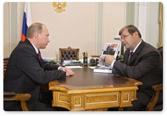 Prime Minister Vladimir Putin meets with Head of the Federal Archive Agency Andrei Artizov