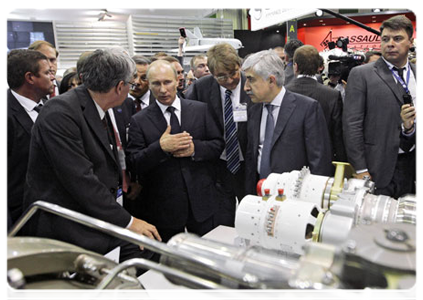 Prime Minister Vladimir Putin at the International Paris Air Show in the suburb of Le Bourget, where he observed the Russian Be-200 and Sukhoi Superjet 100 in flight|21 june, 2011|19:24